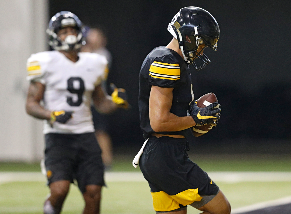 Iowa Hawkeyes wide receiver Oliver Martin (5) scores a touchdown during Fall Camp Practice No. 9 at the Hansen Football Performance Center in Iowa City on Monday, Aug 12, 2019. (Stephen Mally/hawkeyesports.com)
