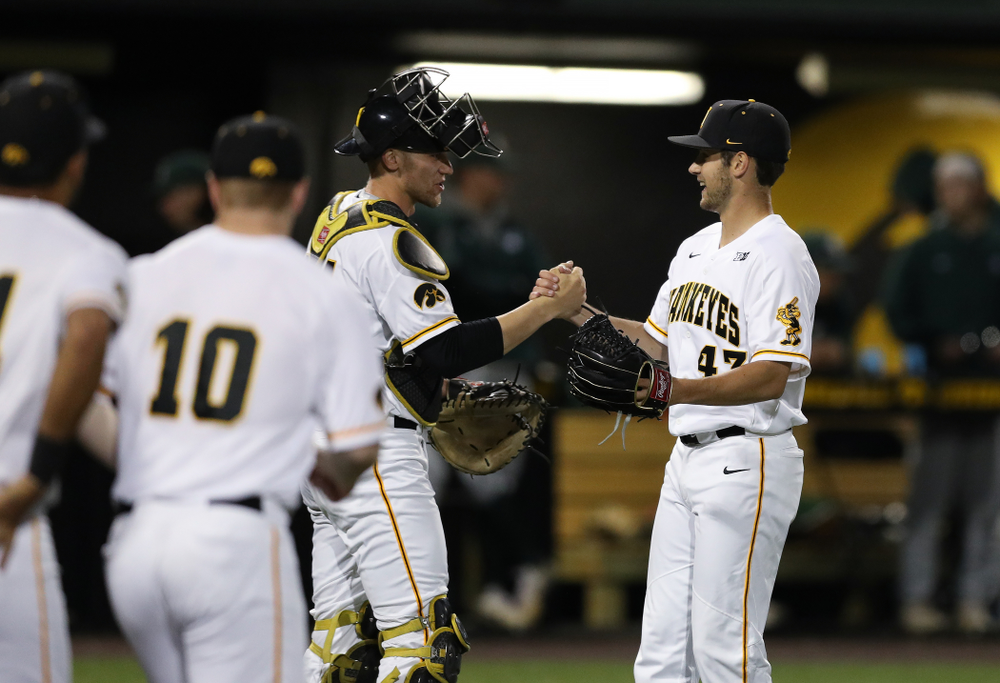 Iowa Hawkeyes Grant Leonard (43) and catcher Austin Martin (34) against the Michigan State Spartans Friday, May 10, 2019 at Duane Banks Field. (Brian Ray/hawkeyesports.com)