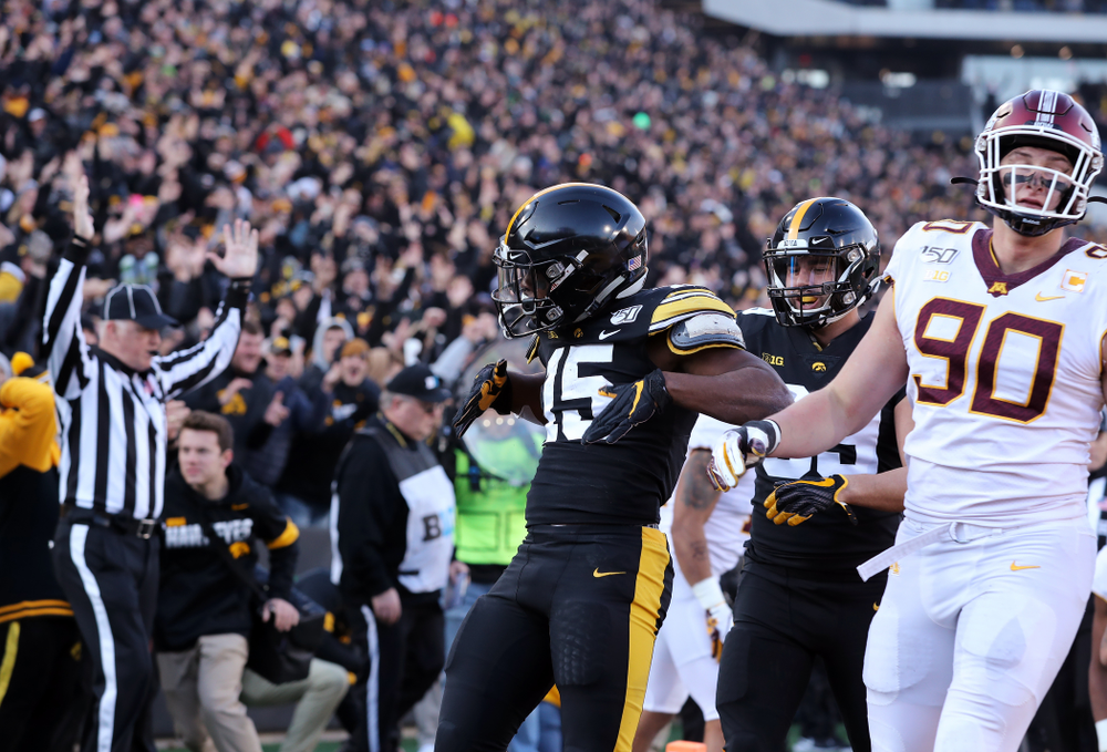 Iowa Hawkeyes running back Tyler Goodson (15) celebrates a touchdown against the Minnesota Golden Gophers Saturday, November 16, 2019 at Kinnick Stadium. (Brian Ray/hawkeyesports.com)
