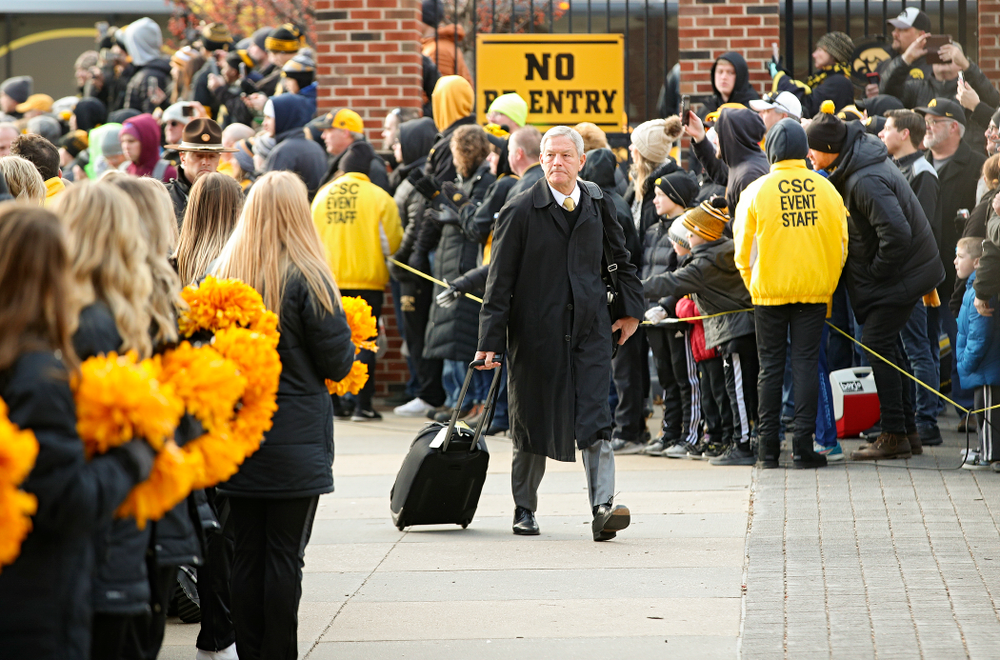Iowa Hawkeyes head coach Kirk Ferentz arrives with his team before their game at Kinnick Stadium in Iowa City on Saturday, Nov 23, 2019. (Stephen Mally/hawkeyesports.com)