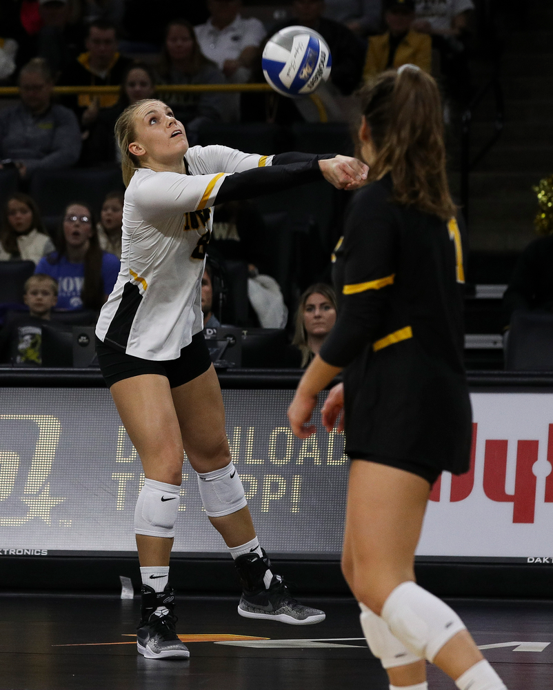 Iowa Hawkeyes right side hitter Reghan Coyle (8) bumps the ball during a match against Rutgers at Carver-Hawkeye Arena on November 2, 2018. (Tork Mason/hawkeyesports.com)