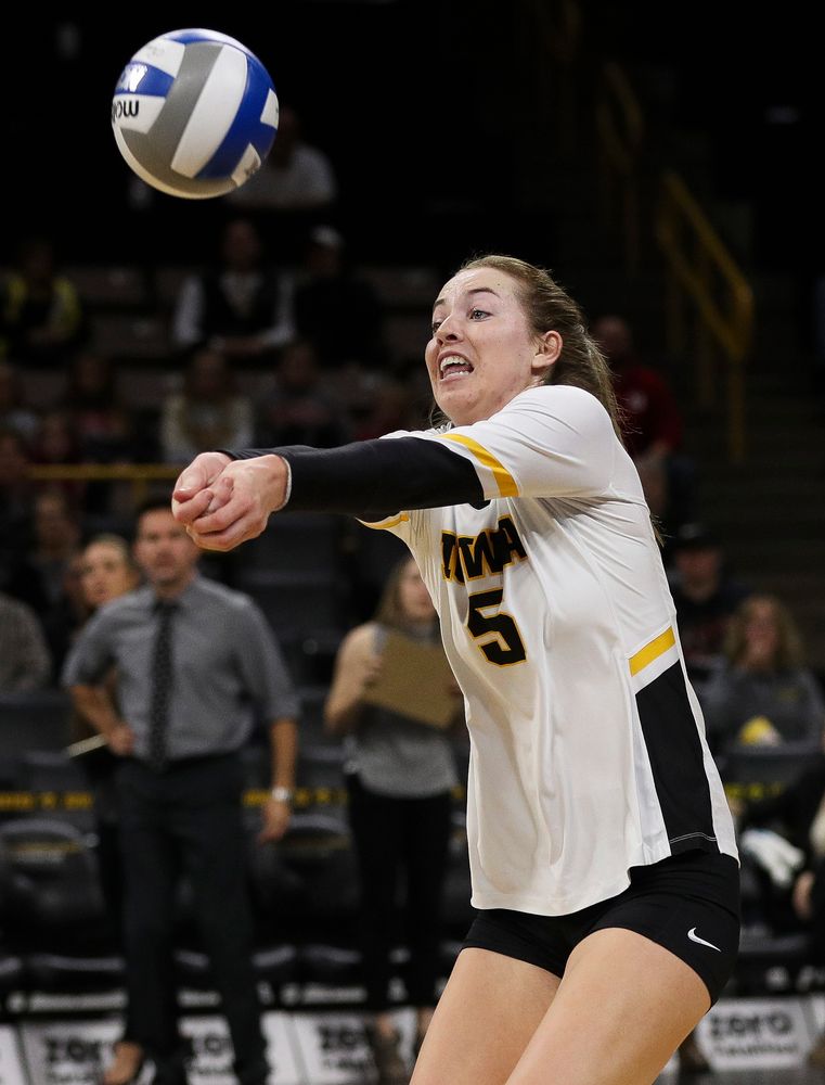 Iowa Hawkeyes outside hitter Meghan Buzzerio (5) bumps the ball during a match against Nebraska at Carver-Hawkeye Arena on November 7, 2018. (Tork Mason/hawkeyesports.com)