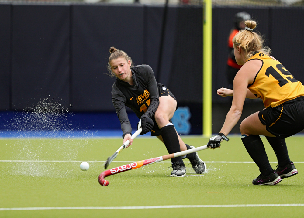 Iowa’s Esme Gibson (15) tries to pass around Ryley Miller (19) during their practice at Karen Shelton Stadium in Chapel Hill, N.C. on Thursday, Nov 14, 2019. (Stephen Mally/hawkeyesports.com)