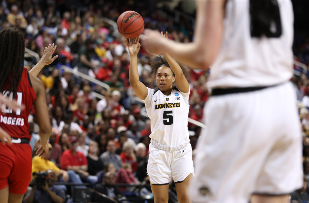 Iowa Hawkeyes guard Alexis Sevillian (5) against the NC State Wolfpack in the regional semi-final of the 2019 NCAA Women's College Basketball Tournament Saturday, March 30, 2019 at Greensboro Coliseum in Greensboro, NC.(Brian Ray/hawkeyesports.com)