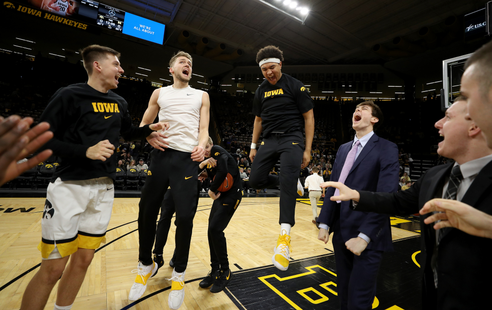 Iowa Hawkeyes guard Austin Ash (13), forward Riley Till (20), and forward Cordell Pemsl (35) against the Michigan Wolverines Friday, January 17, 2020 at Carver-Hawkeye Arena. (Brian Ray/hawkeyesports.com)