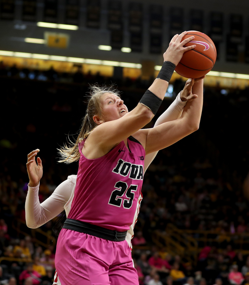 Iowa Hawkeyes forward/center Monika Czinano (25) against the Wisconsin Badgers Sunday, February 16, 2020 at Carver-Hawkeye Arena. (Brian Ray/hawkeyesports.com)