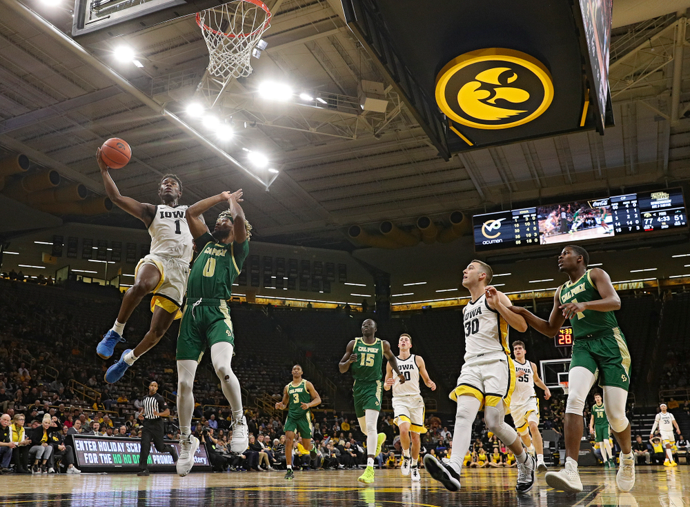 Iowa Hawkeyes guard Joe Toussaint (1) puts up a shot during the second half of their game at Carver-Hawkeye Arena in Iowa City on Sunday, Nov 24, 2019. (Stephen Mally/hawkeyesports.com)