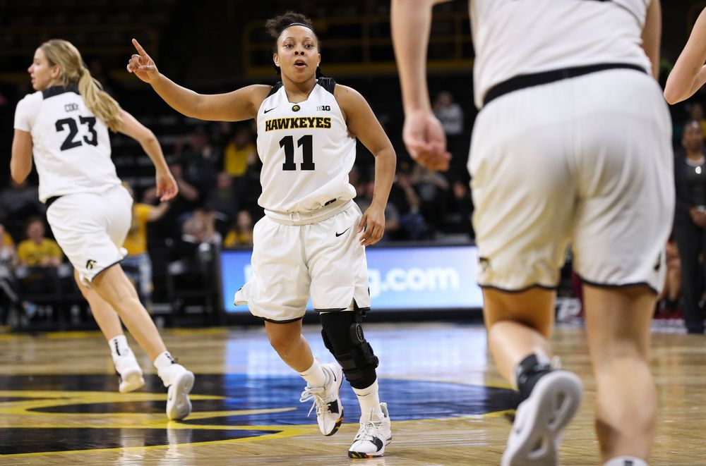 Iowa Hawkeyes guard Tania Davis (11) gives defensive signals during a game against North Carolina Central at Carver-Hawkeye Arena on November 17, 2018. (Tork Mason/hawkeyesports.com)