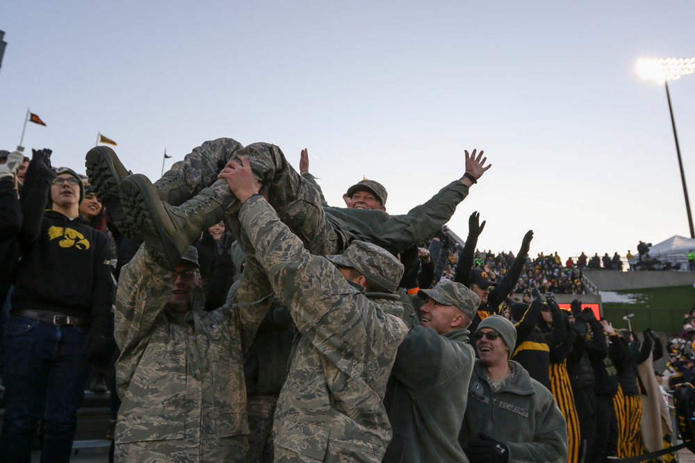 U.S. Service Members participate in the Pancheros Burrito Lift during Iowa football vs Minnesota on Saturday, November 16, 2019 at Kinnick Stadium. (Lily Smith/hawkeyesports.com)