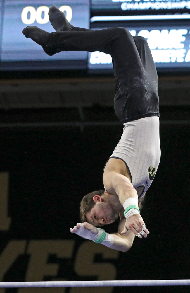 Iowa's Rogelio Vazquez competes in the horizontal bar during the second day of the Big Ten Men's Gymnastics Championships at Carver-Hawkeye Arena in Iowa City on Saturday, Apr. 6, 2019. (Stephen Mally/hawkeyesports.com)