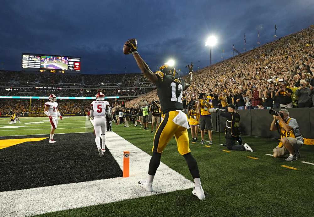 Iowa Hawkeyes wide receiver Brandon Smith (12) celebrates after scoring a touchdown during the second quarter of their game at Kinnick Stadium in Iowa City on Saturday, Aug 31, 2019. (Stephen Mally/hawkeyesports.com)