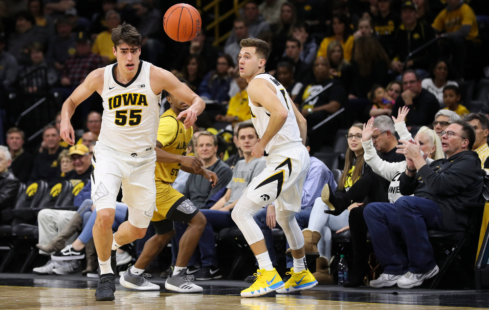 Iowa Hawkeyes forward Luka Garza (55) chases down a loose ball during a game against Alabama State at Carver-Hawkeye Arena on November 21, 2018. (Tork Mason/hawkeyesports.com)