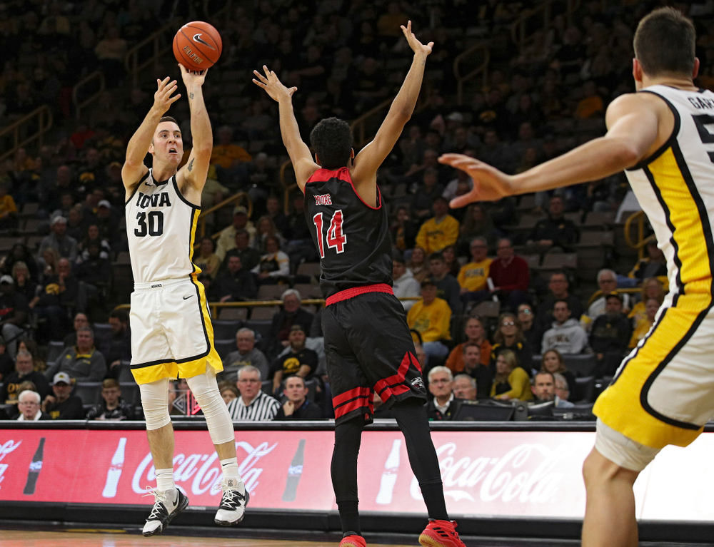 Iowa Hawkeyes guard Connor McCaffery (30) makes a 3-pointer during the second half of their game at Carver-Hawkeye Arena in Iowa City on Friday, Nov 8, 2019. (Stephen Mally/hawkeyesports.com)