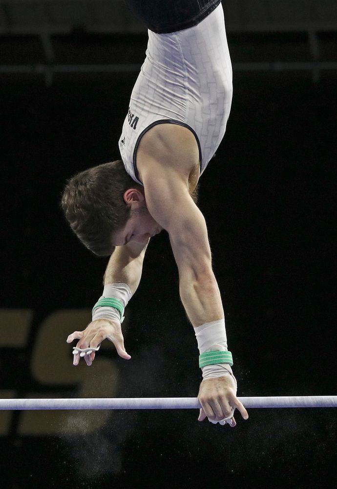 Iowa's Rogelio Vazquez competes in the horizontal bar during the second day of the Big Ten Men's Gymnastics Championships at Carver-Hawkeye Arena in Iowa City on Saturday, Apr. 6, 2019. (Stephen Mally/hawkeyesports.com)