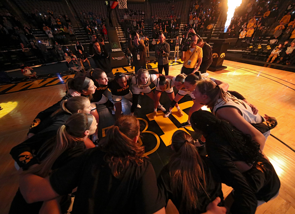 The Hawkeyes huddle before the start of their game at Carver-Hawkeye Arena in Iowa City on Sunday, January 12, 2020. (Stephen Mally/hawkeyesports.com)