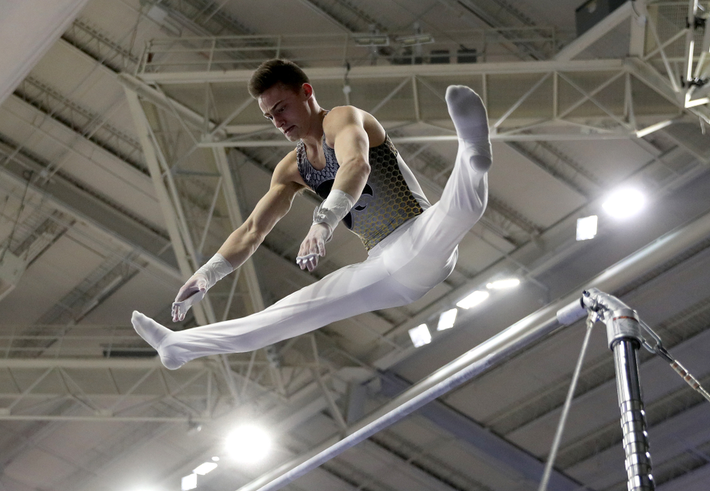 Iowa’s Mitch Mandozzi competes on the high bar against UIC and Minnesota Saturday, February 1, 2020 at Carver-Hawkeye Arena. (Brian Ray/hawkeyesports.com)
