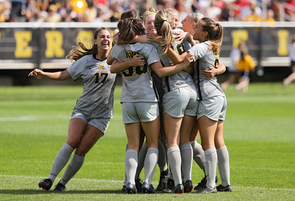 The Hawkeyes celebrate after forward Kaleigh Haus (4) scored a goal during the first half of their match at the Iowa Soccer Complex in Iowa City on Sunday, Sep 1, 2019. (Stephen Mally/hawkeyesports.com)