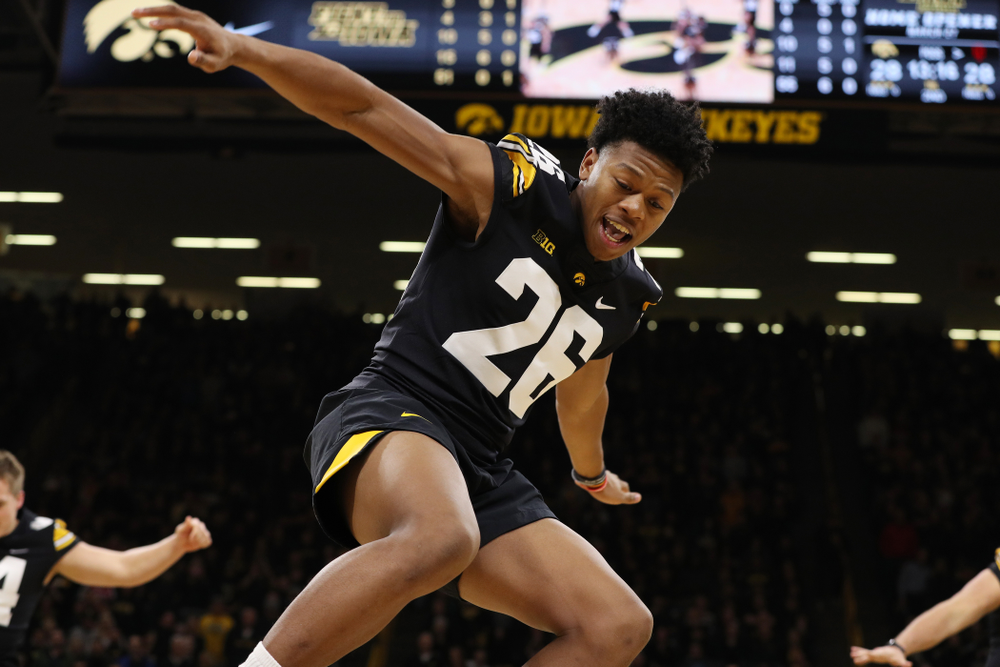 The Iowa Dance Team performs with the Iowa Football Team at halftime of the Iowa Hawkeyes game against the Indiana Hoosiers Friday, February 22, 2019 at Carver-Hawkeye Arena. (Brian Ray/hawkeyesports.com)