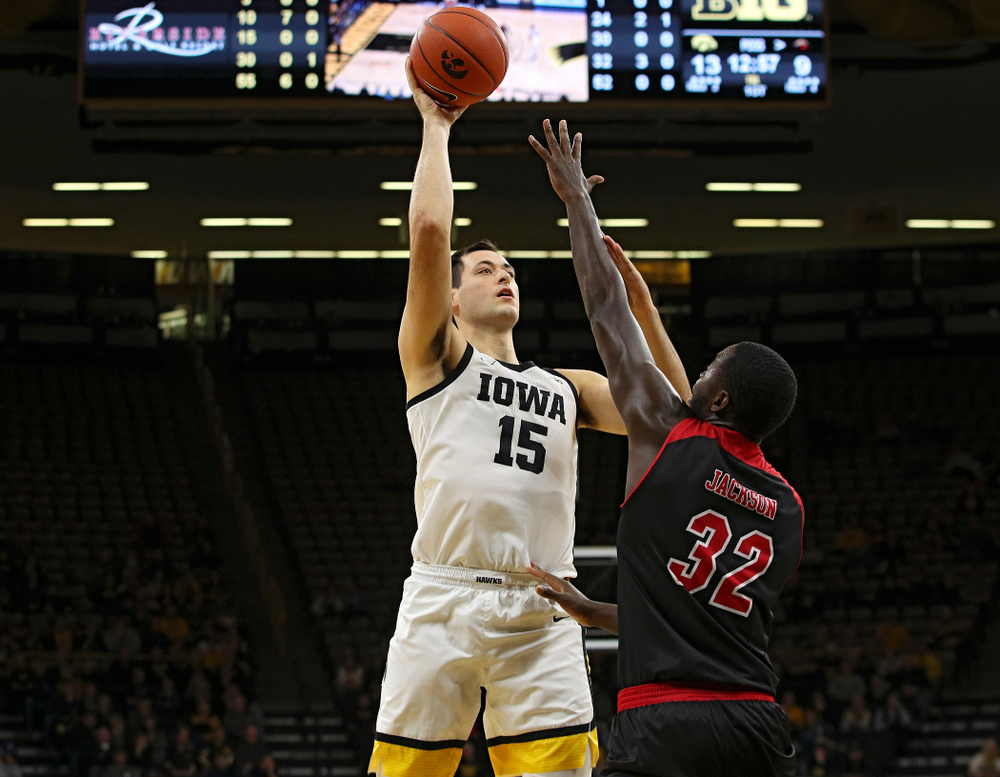 Iowa Hawkeyes forward Ryan Kriener (15) shoots during the first half of their game at Carver-Hawkeye Arena in Iowa City on Friday, Nov 8, 2019. (Stephen Mally/hawkeyesports.com)