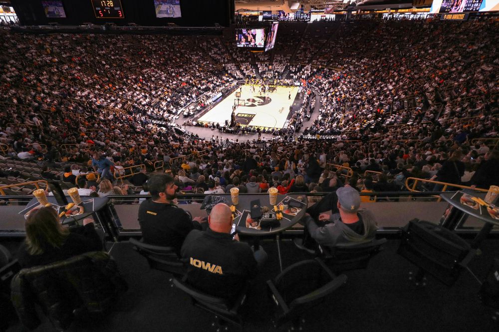 Fans sit in the terrace tables as the Iowa Hawkeyes take on the Illinois Fighting Illini Sunday, January 20