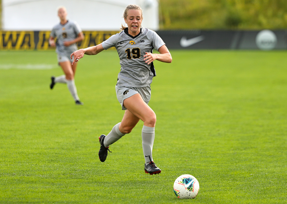 Iowa forward Jenny Cape (19) eyes the ball during the first half of their match at the Iowa Soccer Complex in Iowa City on Sunday, Sep 1, 2019. (Stephen Mally/hawkeyesports.com)