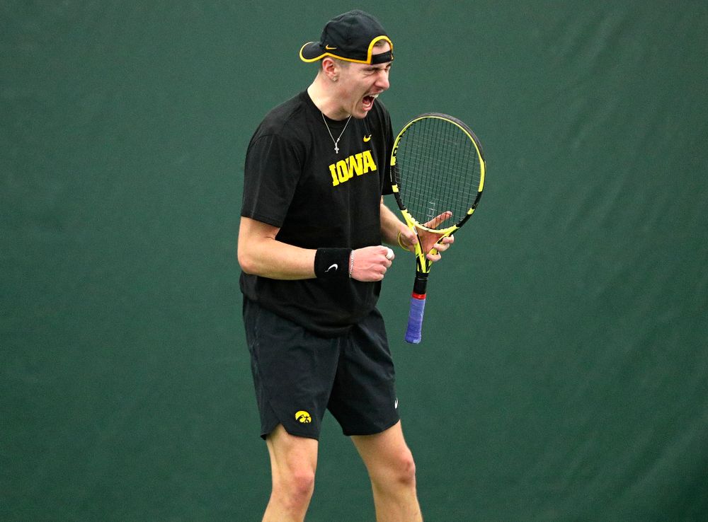 Iowa’s Nikita Snezhko celebrates a point during his singles match at the Hawkeye Tennis and Recreation Complex in Iowa City on Friday, February 14, 2020. (Stephen Mally/hawkeyesports.com)