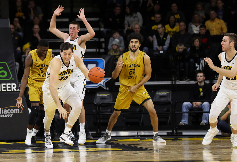 Iowa Hawkeyes forward Ryan Kriener (15) dribbles the ball during a game against Alabama State at Carver-Hawkeye Arena on November 21, 2018. (Tork Mason/hawkeyesports.com)