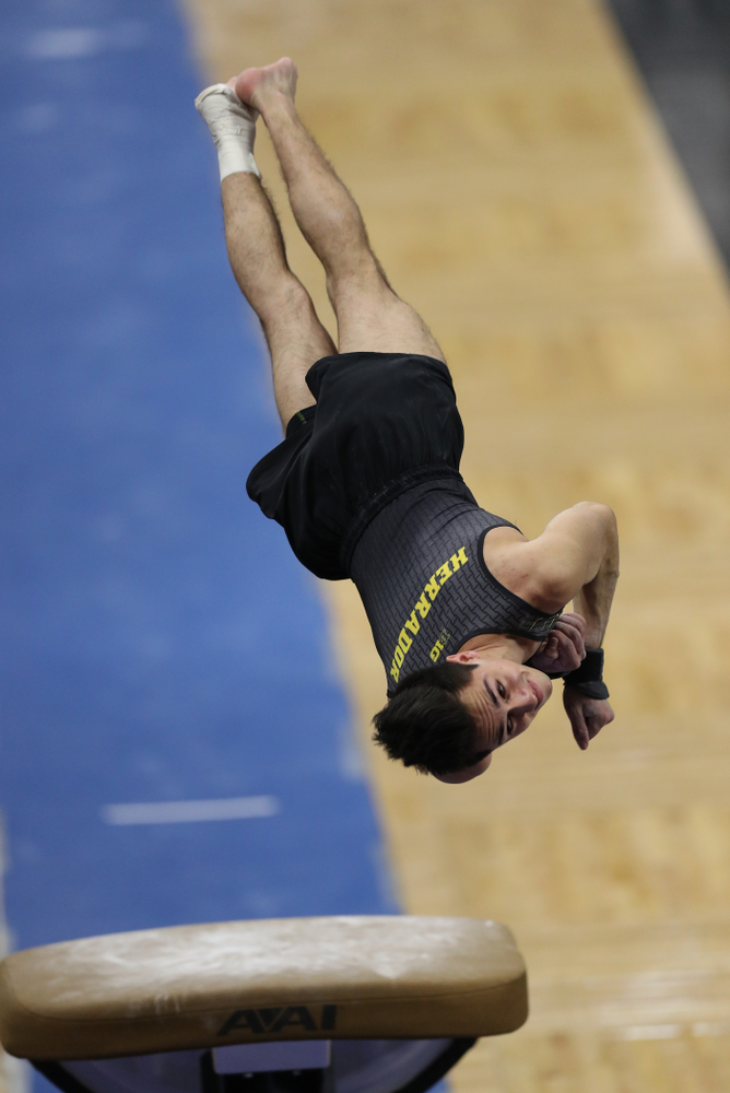 Iowa's Andrew Herrador competes on the vault against Oklahoma Saturday, February 9, 2019 at Carver-Hawkeye Arena. (Brian Ray/hawkeyesports.com)