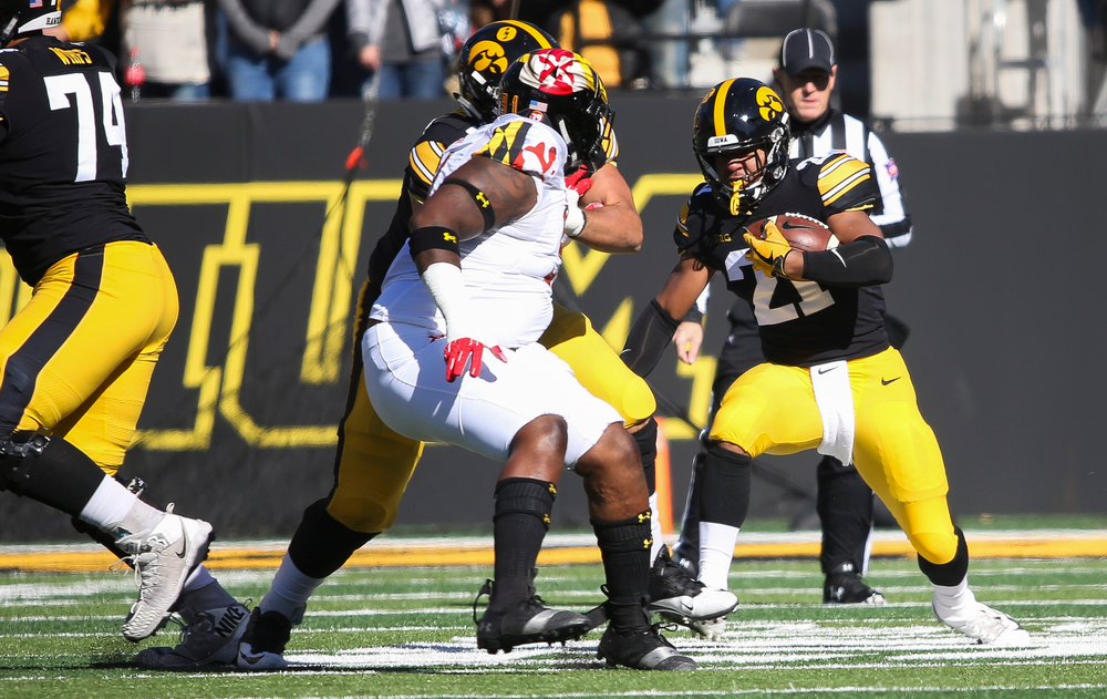 Iowa Hawkeyes running back Ivory Kelly-Martin (21) runs the ball during a game against Maryland at Kinnick Stadium on October 20, 2018. (Tork Mason/hawkeyesports.com)
