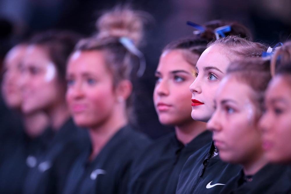 Iowa’s Lauren Guerin stands for the National Anthem before their meet against Michigan State Saturday, February 1, 2020 at Carver-Hawkeye Arena. (Brian Ray/hawkeyesports.com)