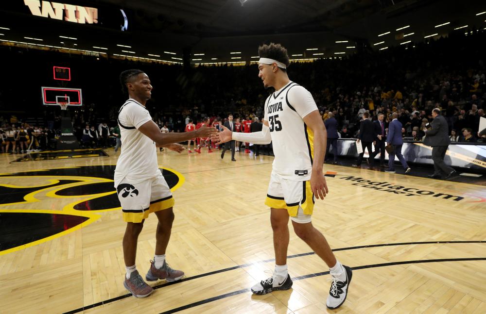 Iowa Hawkeyes guard Bakari Evelyn (4) and forward Cordell Pemsl (35) against the Ohio State Buckeyes Thursday, February 20, 2020 at Carver-Hawkeye Arena. (Brian Ray/hawkeyesports.com)