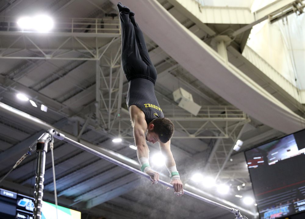 Iowa's Rogelio Vazquez competes on the high bar against the Ohio State Buckeyes Saturday, March 16, 2019 at Carver-Hawkeye Arena. (Brian Ray/hawkeyesports.com)