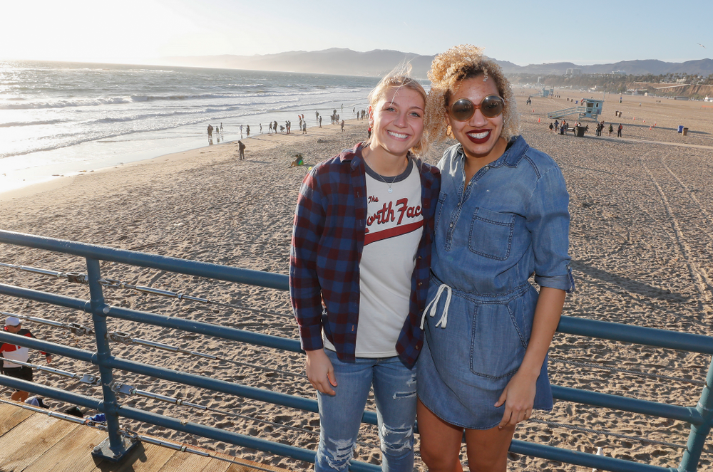 Iowa Hawkeyes forward Carly Mohns (34) and forward Chase Coley (4) on the Santa Monica Pier Thursday, March 15, 2018 in Santa Monica. (Brian Ray/hawkeyesports.com)