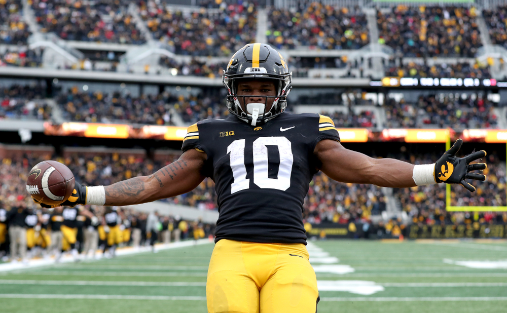 Iowa Hawkeyes running back Mekhi Sargent (10) scores against the Nebraska Cornhuskers Friday, November 23, 2018 at Kinnick Stadium. (Brian Ray/hawkeyesports.com)