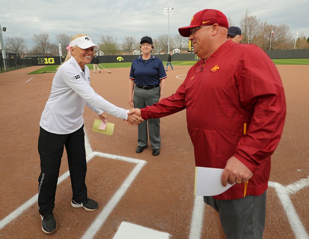 Iowa head coach Renee Gillispie shakes hands with Iowa State head coach Jamie Pinkerton before their game against Iowa State at Pearl Field in Iowa City on Tuesday, Apr. 9, 2019. (Stephen Mally/hawkeyesports.com)