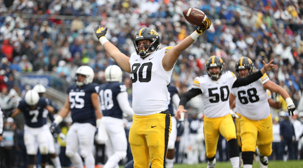 Iowa Hawkeyes defensive end Sam Brincks (90) catches a touchdown pass against the Penn State Nittany Lions Saturday, October 27, 2018 at Beaver Stadium in University Park, Pa. (Max Allen/hawkeyesports.com)
