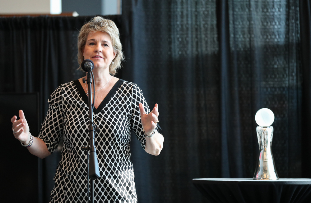 Iowa Hawkeyes head coach Lisa Bluder introduces forward Megan Gustafson (10) during a news conference to announce that Gustafson had won the AP Player of the Year. Wednesday, April 4, 2018 at Amalie Arena in Tampa, FL. (Brian Ray/hawkeyesports.com)