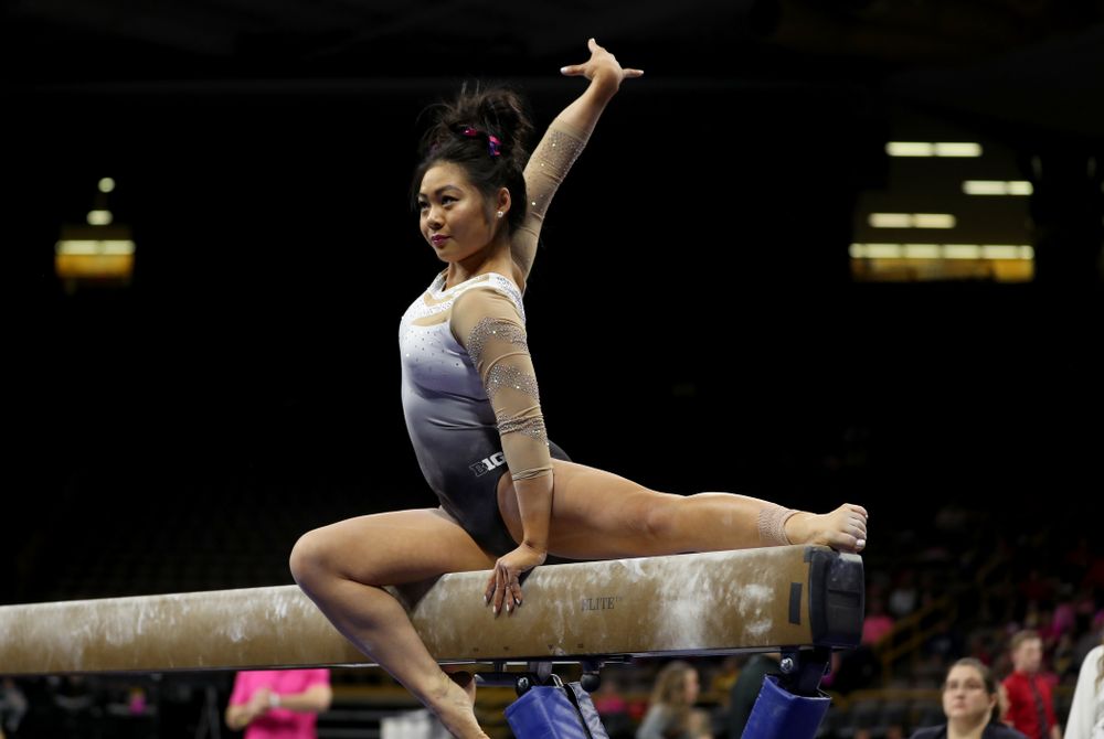 IowaÕs Clair Kaji competes on the beam against Ball State and Air Force Saturday, January 11, 2020 at Carver-Hawkeye Arena. (Brian Ray/hawkeyesports.com)