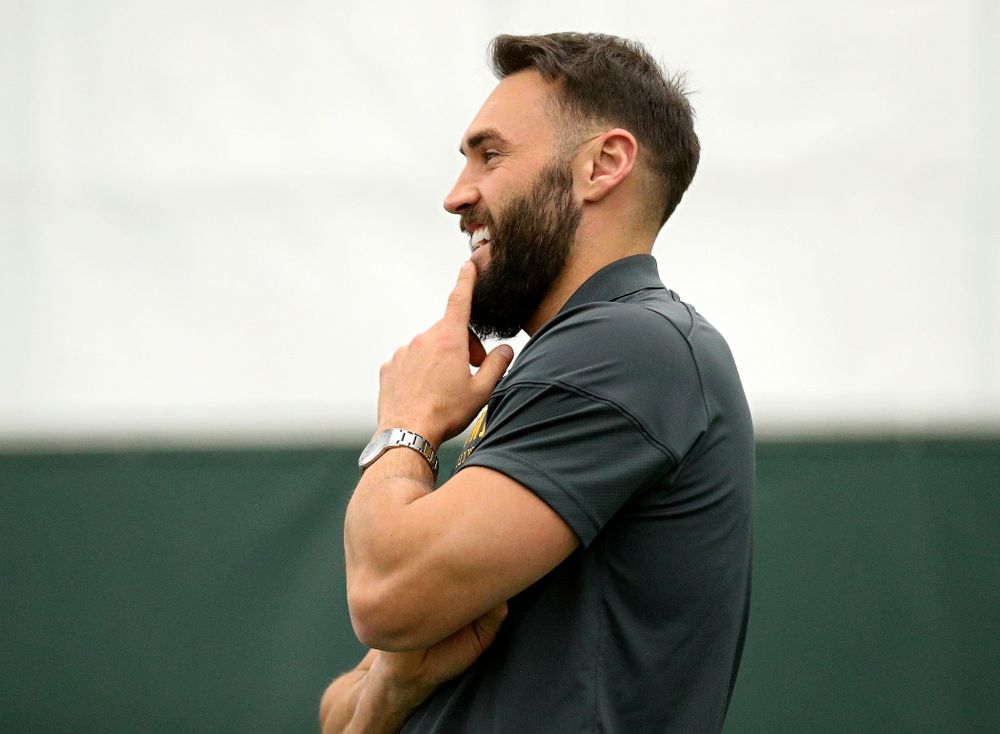 Iowa’s assistant coach Lloyd Bruce-Burgess looks on during a singles match at the Hawkeye Tennis and Recreation Complex in Iowa City on Friday, February 14, 2020. (Stephen Mally/hawkeyesports.com)