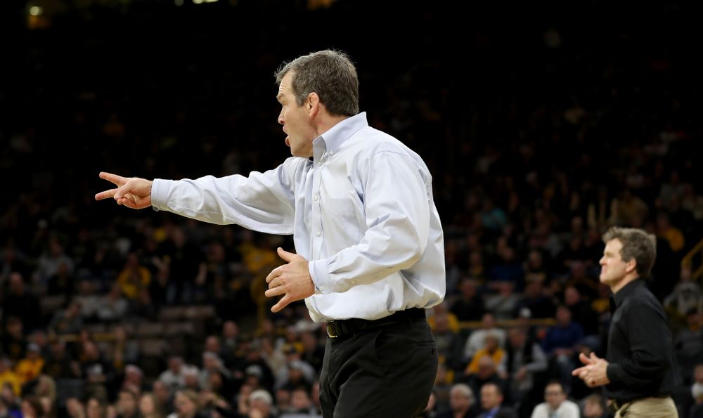 Iowa Hawkeyes head coach Tom Brands calls for a takedown as Kaleb Young wrestles Nebraska’s Peyton Rob at 157 pounds Saturday, January 18, 2020 at Carver-Hawkeye Arena. Young won the match 6-4. (Brian Ray/hawkeyesports.com)