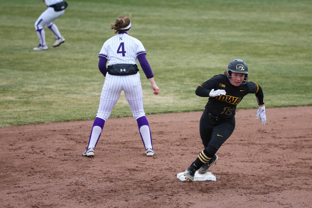 Iowa's Kate Claypool (12) at game 2 vs Northwestern on Saturday, March 30, 2019 at Bob Pearl Field. (Lily Smith/hawkeyesports.com)