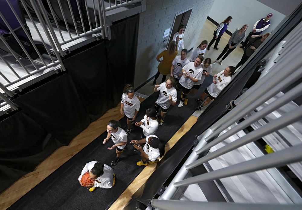 The Hawkeyes wait to take the court before their game at Welsh-Ryan Arena in Evanston, Ill. on Sunday, January 5, 2020. (Stephen Mally/hawkeyesports.com)