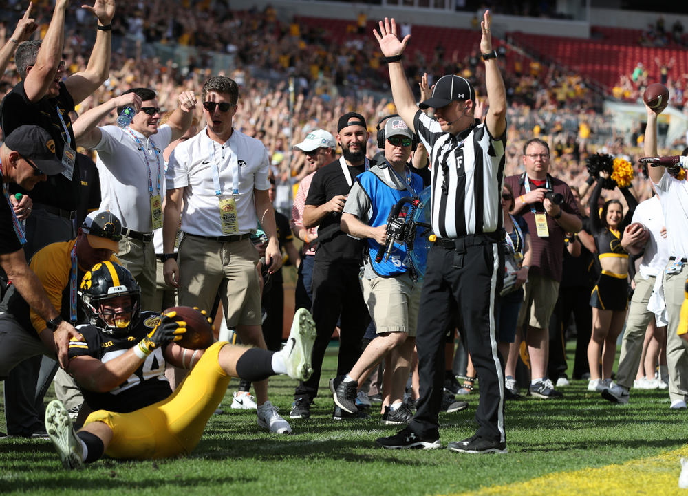Iowa Hawkeyes wide receiver Nick Easley (84) scores during the Outback Bowl Tuesday, January 1, 2019 at Raymond James Stadium in Tampa, FL. (Brian Ray/hawkeyesports.com)