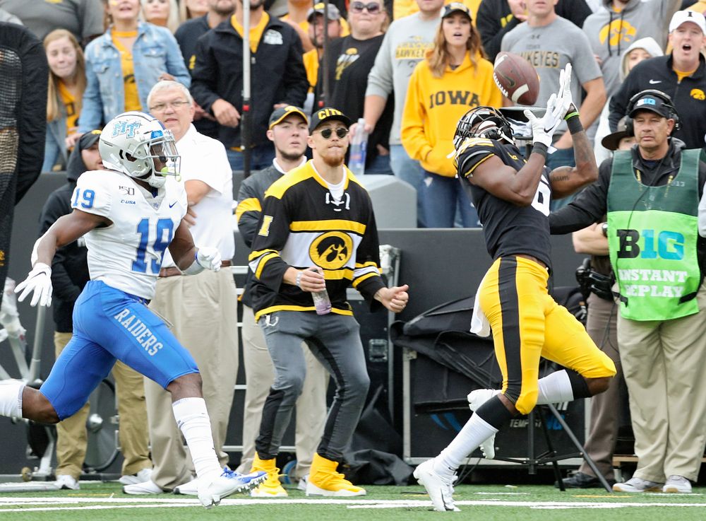 Iowa Hawkeyes wide receiver Ihmir Smith-Marsette (6) pulls in a pass during the second quarter of their game at Kinnick Stadium in Iowa City on Saturday, Sep 28, 2019. (Stephen Mally/hawkeyesports.com)