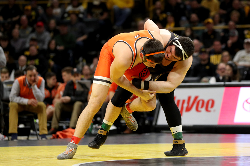 Iowa’s Tony Cassioppi wrestles Oklahoma State’s Auston Harris at heavyweight Sunday, February 23, 2020 at Carver-Hawkeye Arena. Cassioppi won the match 11-1. (Brian Ray/hawkeyesports.com)