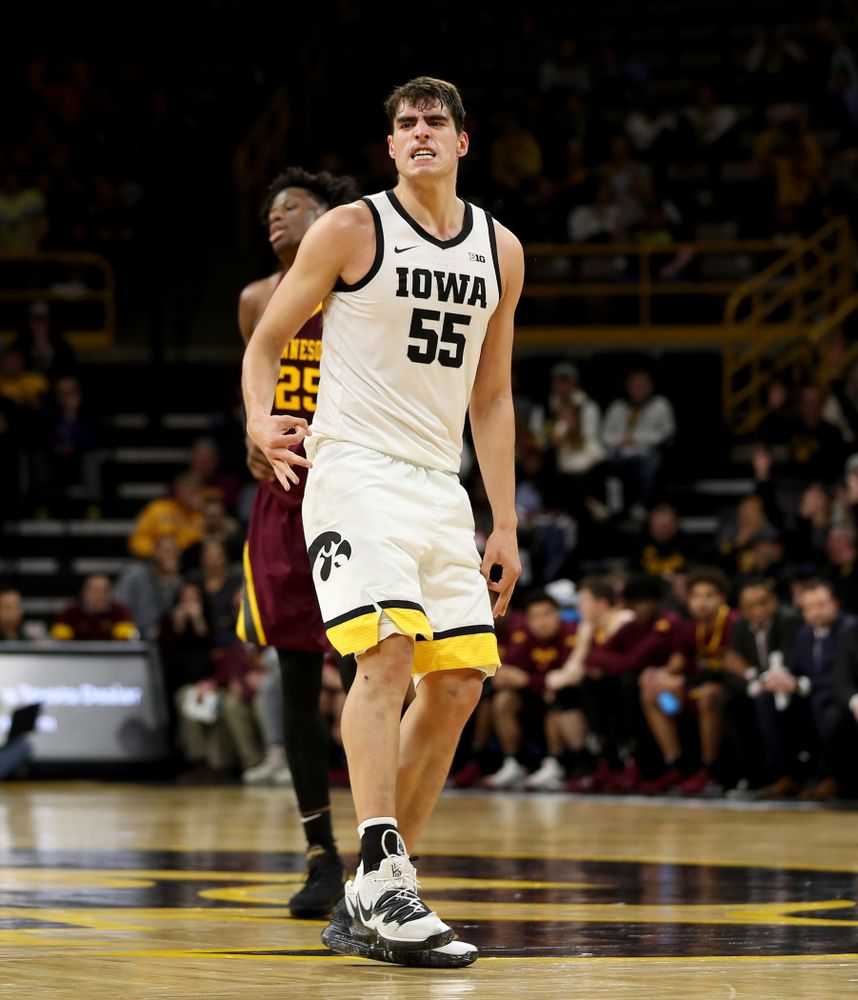 Iowa Hawkeyes forward Luka Garza (55) celebrates a three point basket against the Minnesota Golden Gophers Monday, December 9, 2019 at Carver-Hawkeye Arena. (Brian Ray/hawkeyesports.com)