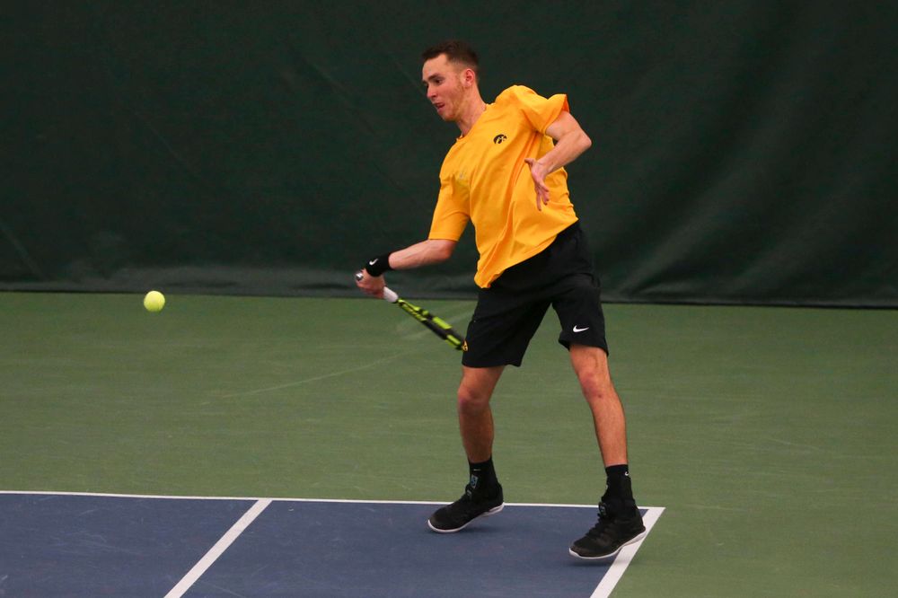 Iowa's Kareem Allaf at a tennis match vs Drake Friday, March 8, 2019 at the Hawkeye Tennis and Recreation Complex. (Lily Smith/hawkeyesports.com)