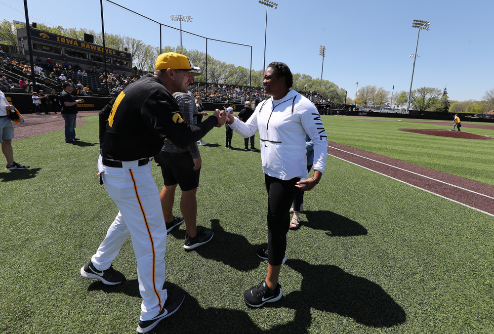 Iowa Track and FieldÕs Laulauga Tausaga throws out a first pitch before the Iowa Hawkeyes second game against UC Irvine Saturday, May 4, 2019 at Duane Banks Field. (Brian Ray/hawkeyesports.com)