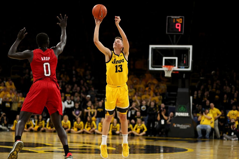 Iowa Hawkeyes guard Austin Ash (13) against the Nebraska Cornhuskers Saturday, February 8, 2020 at Carver-Hawkeye Arena. (Brian Ray/hawkeyesports.com)