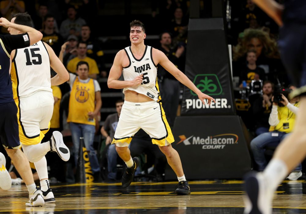 Iowa Hawkeyes forward Luka Garza (55) knocks down a shot against the Michigan Wolverines Friday, January 17, 2020 at Carver-Hawkeye Arena. (Brian Ray/hawkeyesports.com)